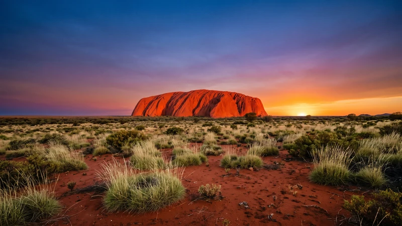 Uluru glowing red at sunset in the outback, Northern Territory