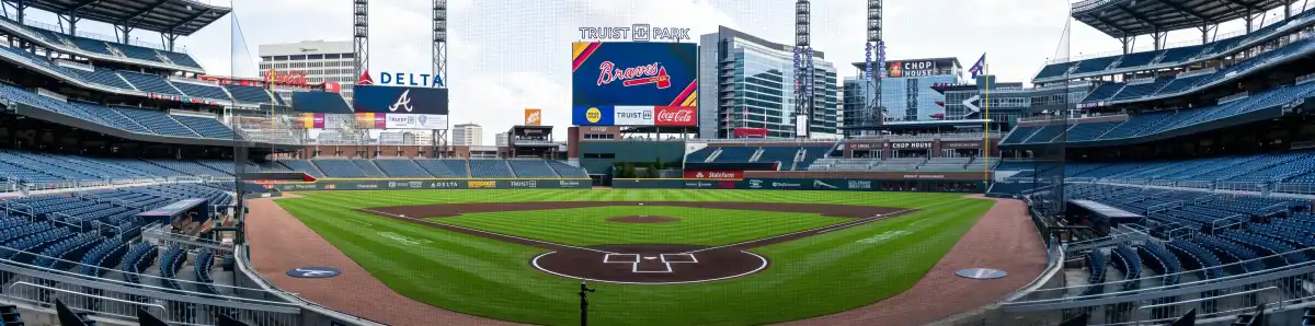 Inside Truist Park concourse with Braves championship memorabilia and banners on display