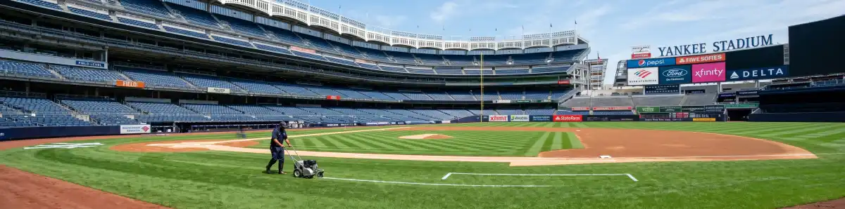 Inside Yankee Stadium looking across the baseball diamond with the iconic frieze visible